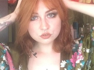 rene-caster redhead young cam girl being naughty and seductive on a live webcam