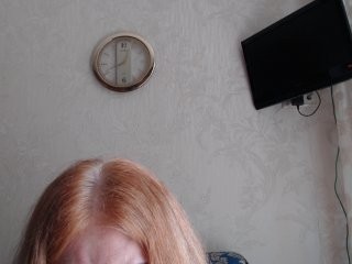 mona-lisa redhead mature cam girl being naughty and seductive on a live webcam