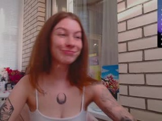 ohh_moon redhead being naughty and seductive on a live webcam