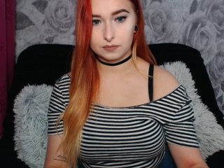 ladykaya redhead young cam girl being naughty and seductive on a live webcam