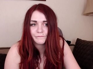 busilady redhead being naughty and seductive on a live webcam