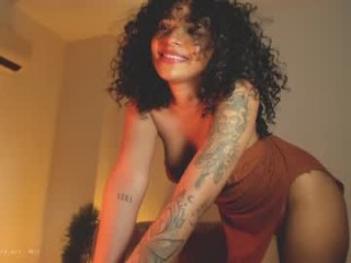 arylove__ with a hairy pussy teasing it on a sex cam