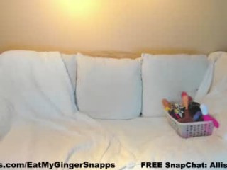 eatmygingersnapps doing it solo, pleasuring her little pussy live on webcam